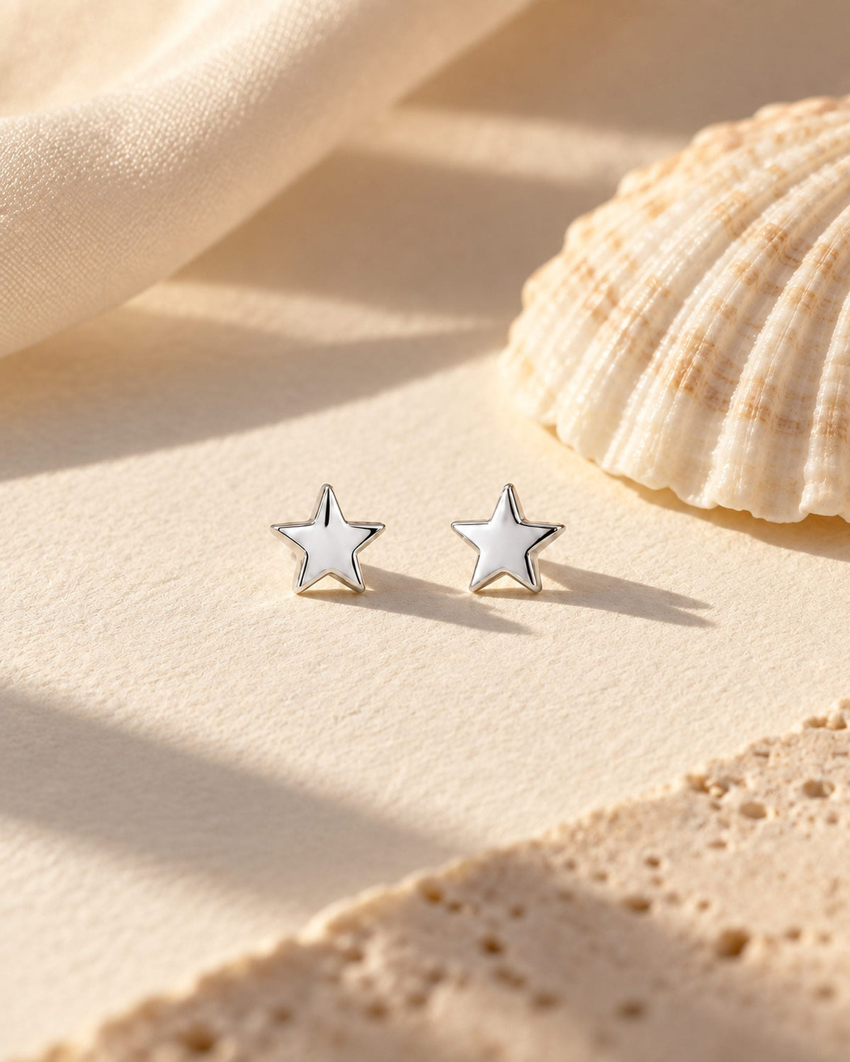 Puces Stella argent sur papier coton